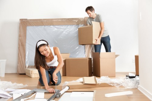Furniture removals team working in a St Johns Wood residential street