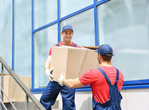 Specialist piano movers planning a careful removal in St Johns Wood