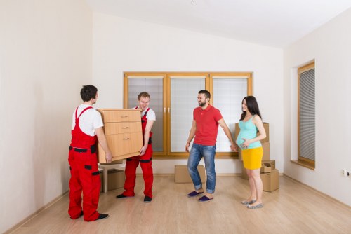 Packed boxes and furniture ready for apartment removals
