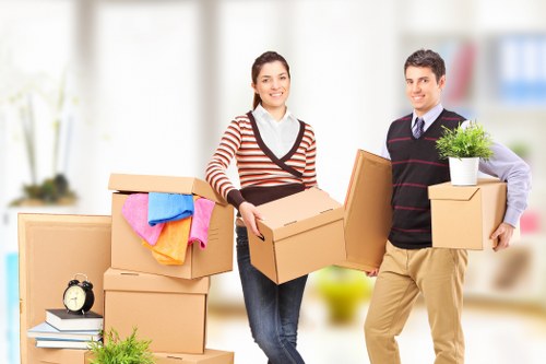 Packed office equipment and furniture ready for relocation