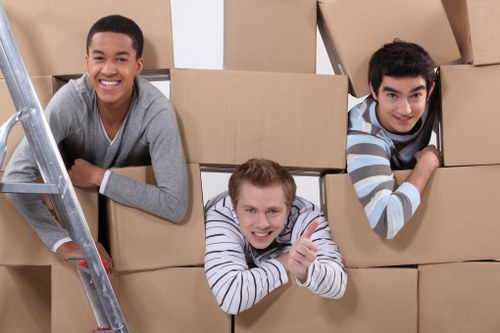 A well-organised home move with boxes and furniture ready for transport in St Johns Wood