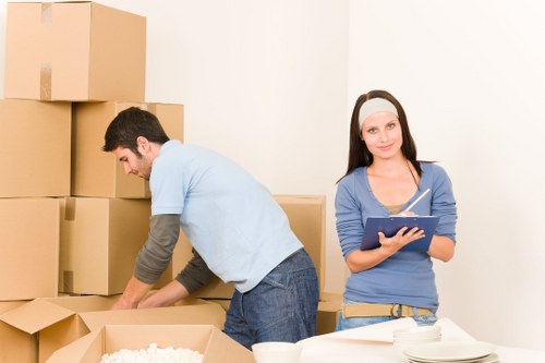 Professional man and van service using safe working practices in St Johns Wood